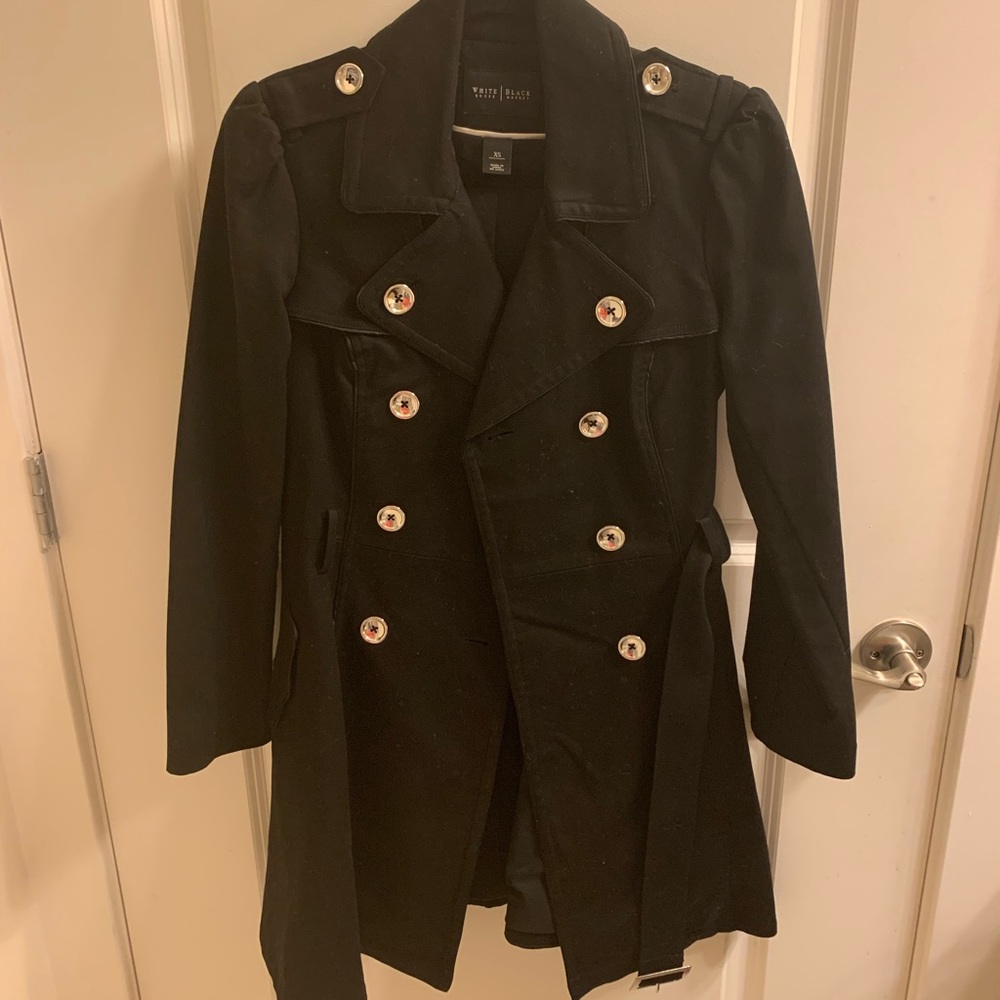 Black jacket. Buttons up front with tie